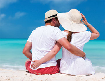 Couple relaxing on the beach